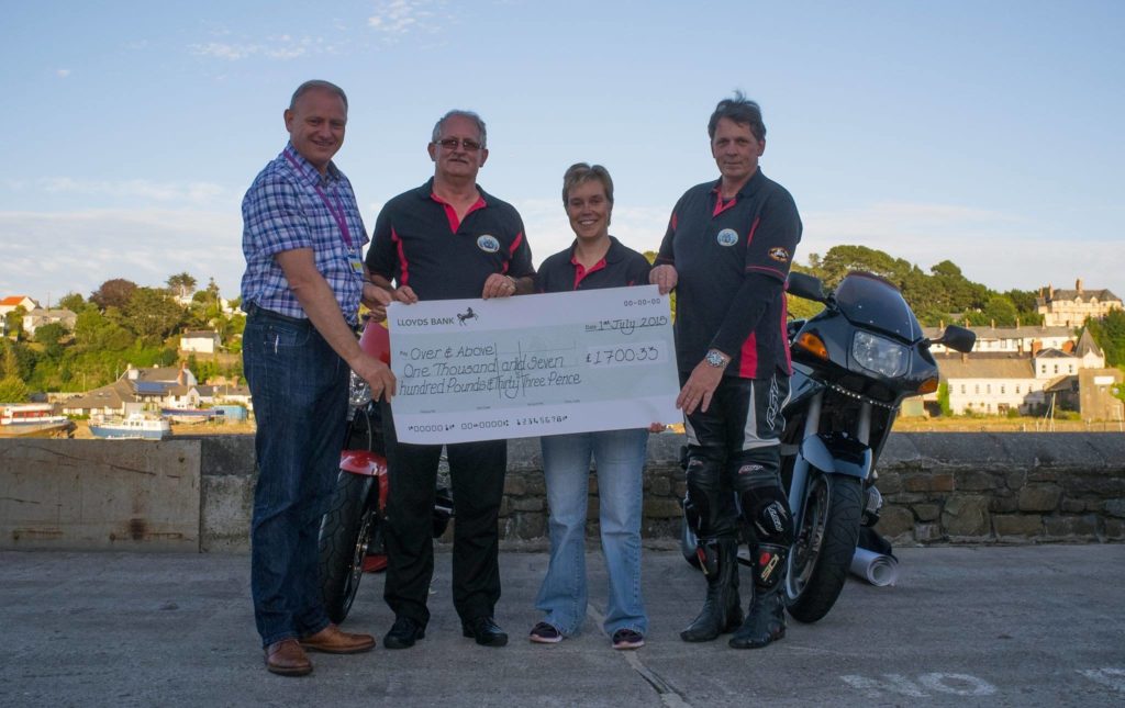 Bideford Bike Show Organisers Lisa, Terry and Mike present Fundraising Manager Ian Roome with a £1,700 cheque for the Seamoor Unit.